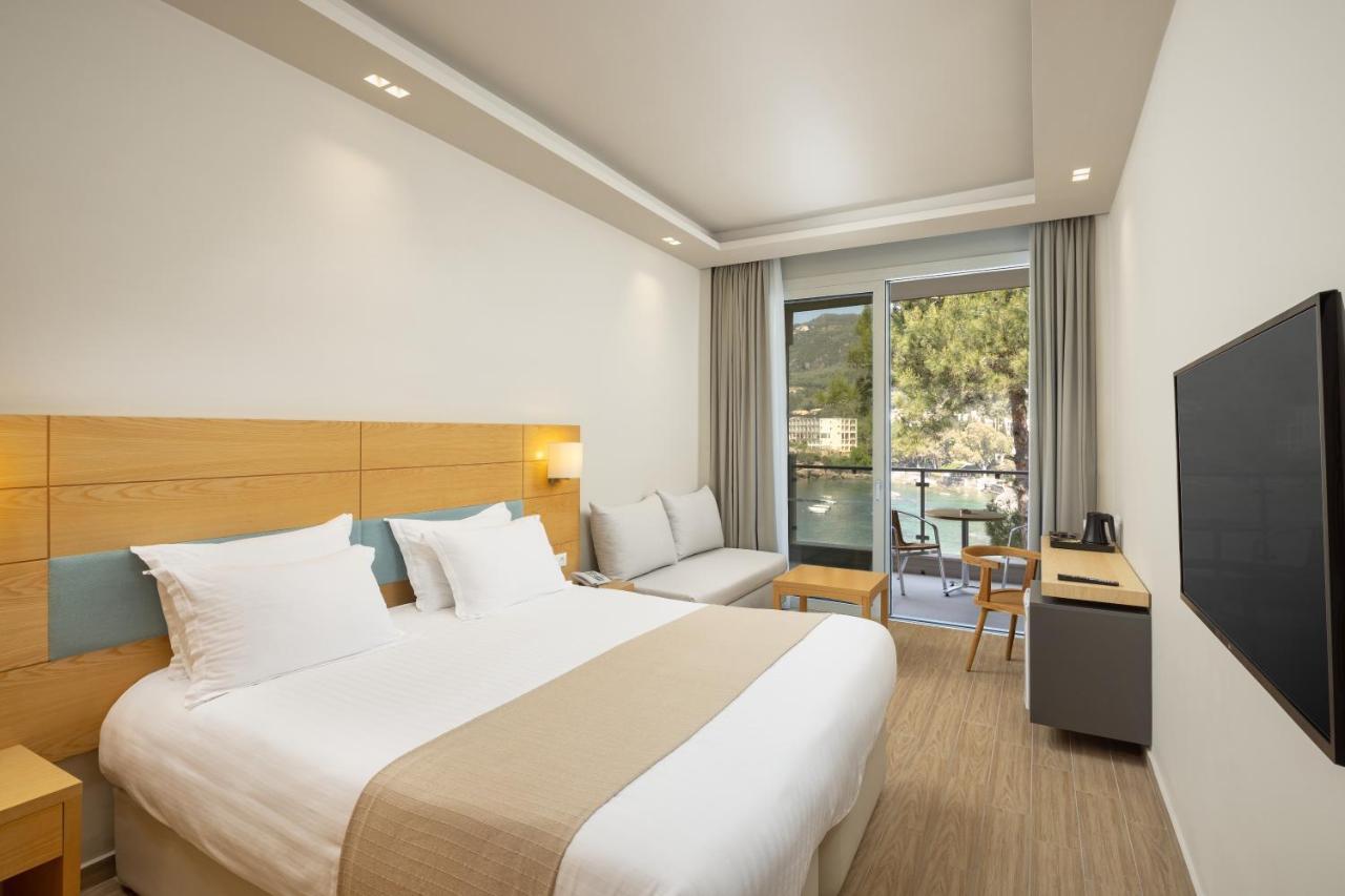 Akrotiri Beach Resort Hotel - Adult Friendly Paleokastritsa Bagian luar foto A room at the hotel