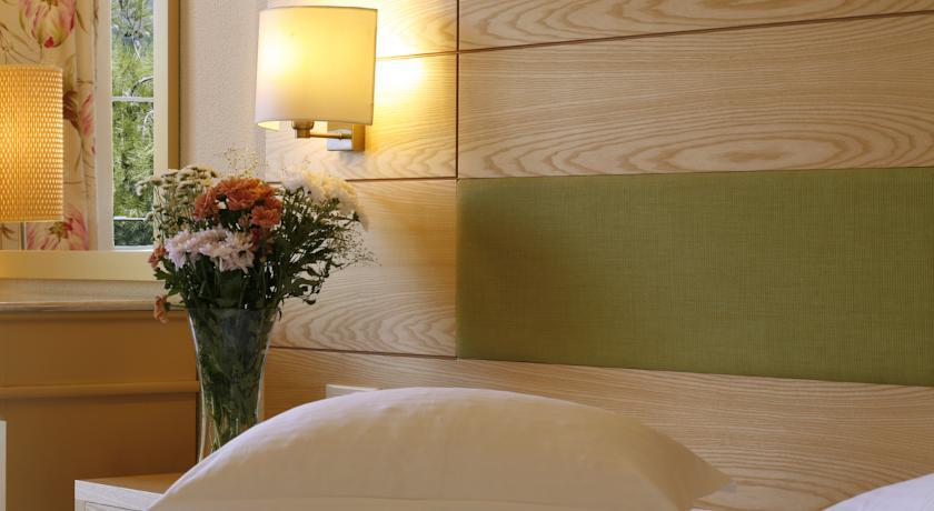 Akrotiri Beach Resort Hotel - Adult Friendly Paleokastritsa Bagian luar foto A wall light