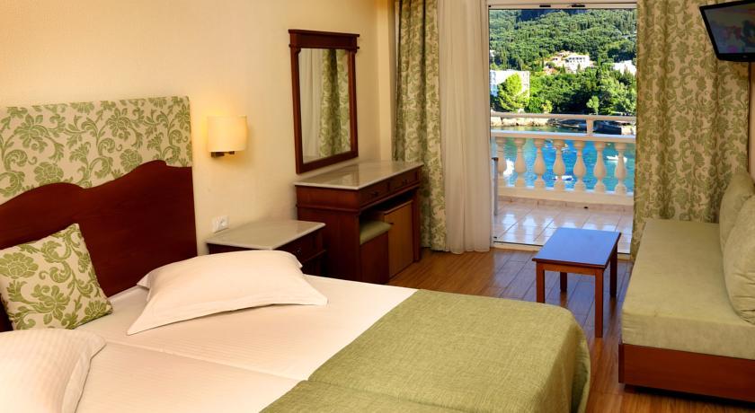 Akrotiri Beach Resort Hotel - Adult Friendly Paleokastritsa Bagian luar foto A typical hotel room