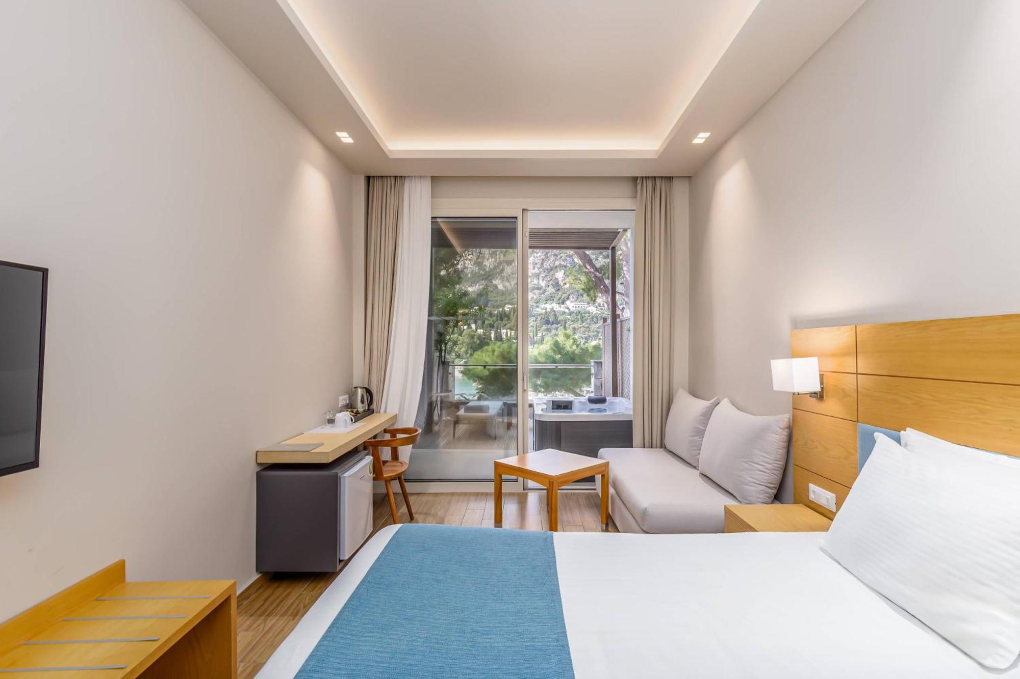 Akrotiri Beach Resort Hotel - Adult Friendly Paleokastritsa Bagian luar foto A room at the hotel