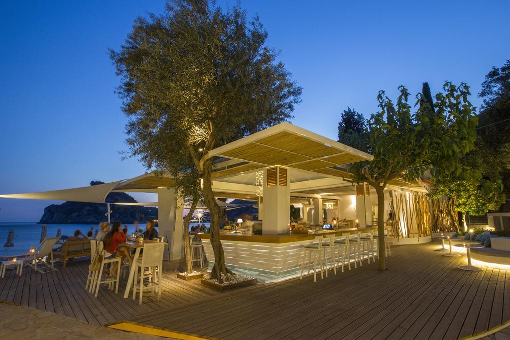 Akrotiri Beach Resort Hotel - Adult Friendly Paleokastritsa Bagian luar foto The bar at the beach